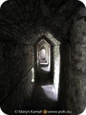 SX16121 Covered walkway towards caves under Carreg Cennen Castle.jpg