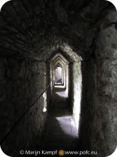 SX16121 Covered walkway towards caves under Carreg Cennen Castle.jpg
