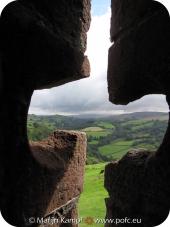 SX16127 View through arrow hole of Carreg Cennen Castle.jpg